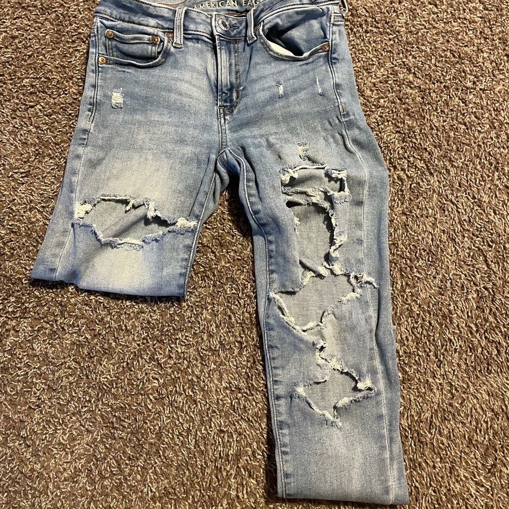 American Eagle distressed next level stretch jeggings size (6).. note flaw